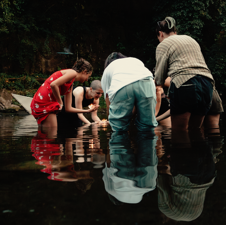 placing the tributes in the water